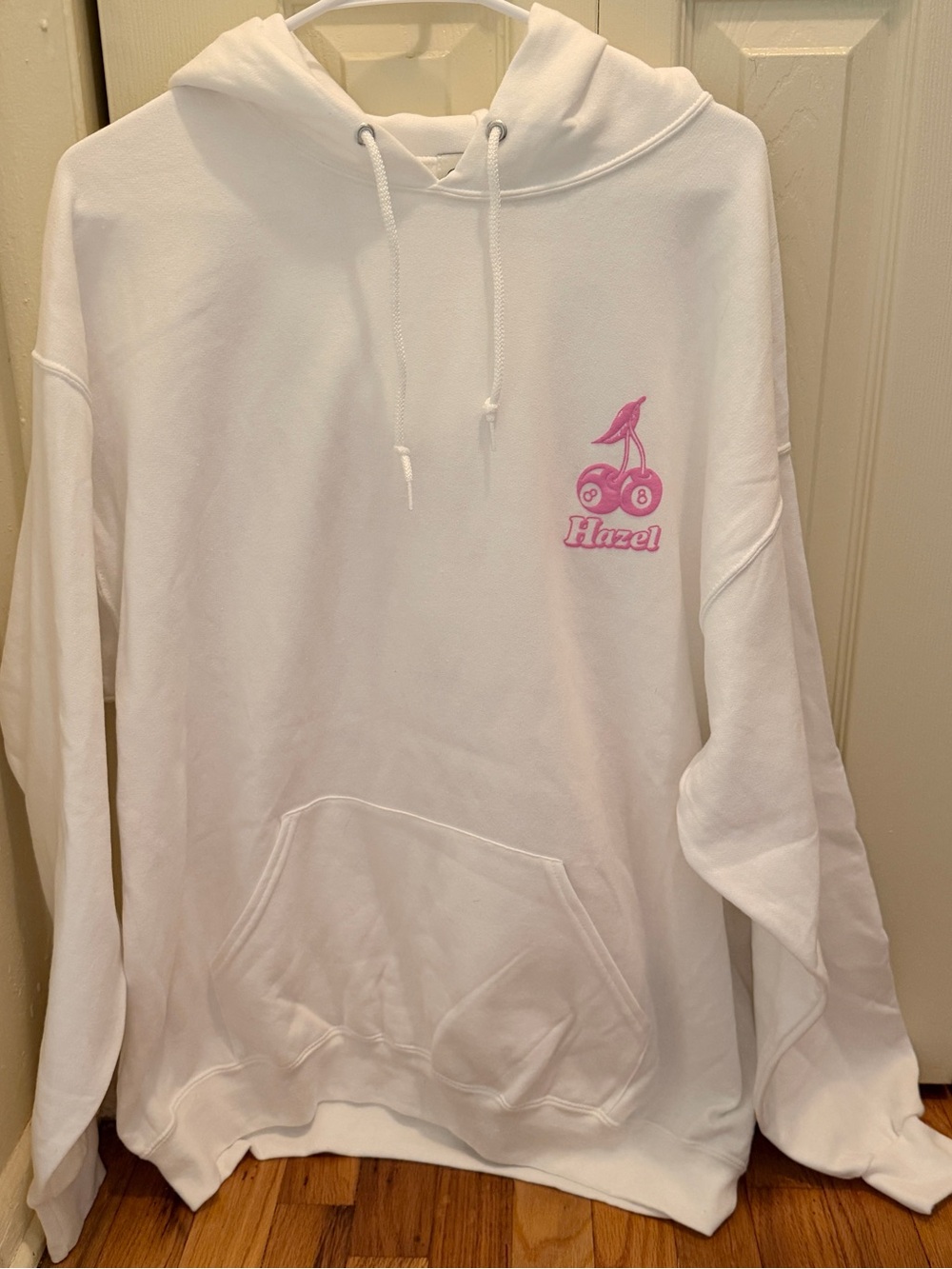 hazel White Pullover Hoodie with Pink Cherry Graphic